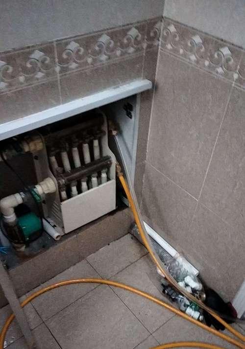清洗暖气片热水器的方法（让你的暖气片热水器恢复正常热效果的简单技巧）