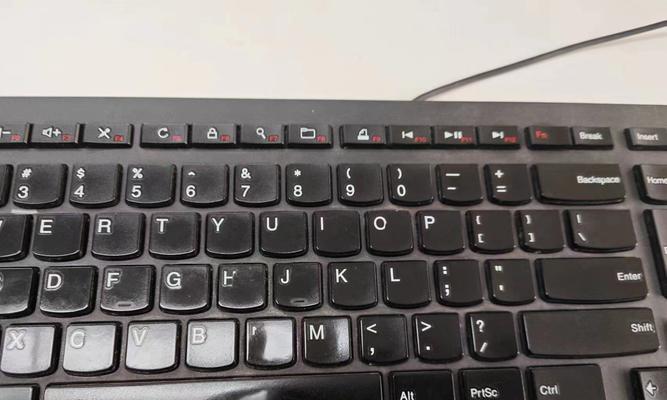 联想飞碟键盘拆卸步骤是什么